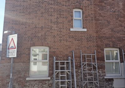 Brick repointing work in process